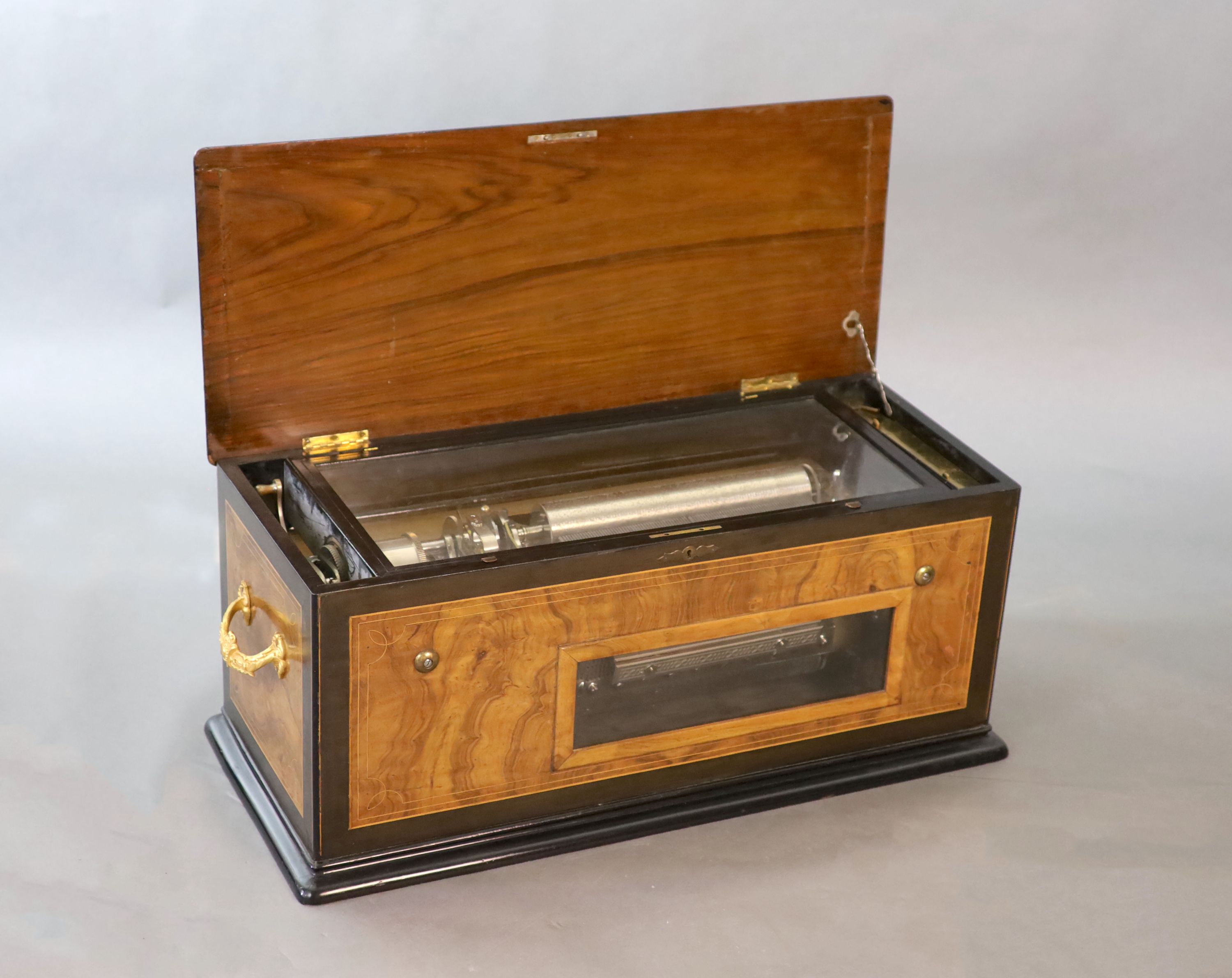 A rare Swiss quatre-revolver cylinder musical box, late 19th century 88 x 36cm, 38cm high.
